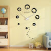 Horloge Large noire avec des cercles avec le texte Love